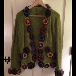 Wool cardigan with knit flower adornment